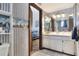 View of a bathroom with a vanity and access to a bedroom at 1118 Cypress W Pt, Winter Haven, FL 33884