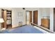 Bedroom with double closets, dresser and en-suite bathroom at 1118 Cypress W Pt, Winter Haven, FL 33884