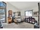 Bright bedroom with large windows and wall decor at 1118 Cypress W Pt, Winter Haven, FL 33884