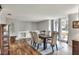 Dining room with hardwood floors and built-in shelving at 1118 Cypress W Pt, Winter Haven, FL 33884