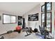 Home gym with weights, punching bag, and exercise equipment at 1118 Cypress W Pt, Winter Haven, FL 33884