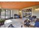 Screened porch with grill and access ramp at 1118 Cypress W Pt, Winter Haven, FL 33884