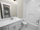 Clean bathroom with white vanity and bathtub at 161 Laynewade Rd, Polk City, FL 33868