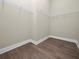 Well-lit walk-in closet with wire shelving for storage at 161 Laynewade Rd, Polk City, FL 33868