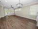 Bright and airy living room with hardwood floors and access to backyard at 161 Laynewade Rd, Polk City, FL 33868