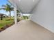 Large covered patio with access to backyard at 234 Laynewade Rd, Polk City, FL 33868