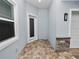 Inviting entryway with brick flooring and modern door at 234 Laynewade Rd, Polk City, FL 33868