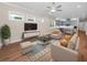 Living room with hardwood floors and stylish furniture at 234 Laynewade Rd, Polk City, FL 33868