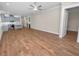 Spacious living room with wood-look floors and ceiling fan at 234 Laynewade Rd, Polk City, FL 33868