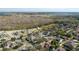 Community aerial showcases proximity to amenities and natural surroundings at 252 Magneta Loop, Auburndale, FL 33823