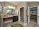 Bathroom with walk-in shower, toilet, vanity, and large closet at 252 Magneta Loop, Auburndale, FL 33823