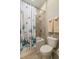 A well-lit bathroom featuring a shower-tub combination and updated fixtures at 252 Magneta Loop, Auburndale, FL 33823