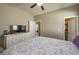 Cozy bedroom with a comfortable bed and plenty of closet space at 252 Magneta Loop, Auburndale, FL 33823