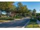 Landscaped entrance to The Estates of Auburndale community at 252 Magneta Loop, Auburndale, FL 33823