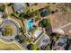 Community pool and recreation area with surrounding landscape at 252 Magneta Loop, Auburndale, FL 33823