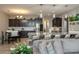 Open floor plan with kitchen island and spacious living room at 252 Magneta Loop, Auburndale, FL 33823
