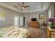 Relaxing main bedroom with a plush bed and built-in dresser at 252 Magneta Loop, Auburndale, FL 33823