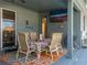 Covered patio with dining table, seating area, and TV at 252 Magneta Loop, Auburndale, FL 33823