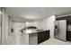 Modern kitchen with island, stainless steel appliances, and hardwood floors at 3146 Laurel Oak Ln, Winter Haven, FL 33884