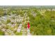 Aerial view showing home's location in a residential area at 32334 Oak Park Dr, Leesburg, FL 34748