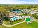 Community pool, clubhouse, tennis courts, and putting green at 32334 Oak Park Dr, Leesburg, FL 34748