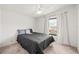 Bedroom with double bed and ceiling fan at 32334 Oak Park Dr, Leesburg, FL 34748