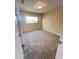 Bedroom featuring neutral carpeting, beige walls, and a window with blinds at 3441 Grenville Dr, Winter Haven, FL 33884