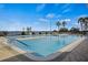 Resort-style community pool with a clear blue water and waterfront views at 3441 Grenville Dr, Winter Haven, FL 33884