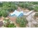 Aerial view of a home on a large lot with trees at 3960 Laurel Se Ave, Lakeland, FL 33812