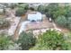 Aerial view showing a home with a long driveway and surrounding trees at 3960 Laurel Se Ave, Lakeland, FL 33812