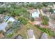 Aerial view showing home on a large lot with trees at 3960 Laurel Se Ave, Lakeland, FL 33812