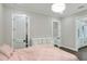 Bright bedroom with a comfortable bed and en-suite bathroom at 3960 Laurel Se Ave, Lakeland, FL 33812