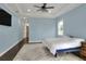 Spacious bedroom with light blue walls and hardwood floors at 3960 Laurel Se Ave, Lakeland, FL 33812