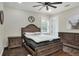 Cozy bedroom featuring a wooden bed frame and ample storage at 3960 Laurel Se Ave, Lakeland, FL 33812