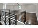 Spacious bonus room with dark hardwood floors and a ceiling fan at 3960 Laurel Se Ave, Lakeland, FL 33812