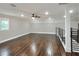 Bright bonus room featuring hardwood floors and a ceiling fan at 3960 Laurel Se Ave, Lakeland, FL 33812