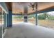 Large covered patio with fireplace and open views of backyard at 3960 Laurel Se Ave, Lakeland, FL 33812