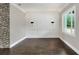 Bright dining room with hardwood floors and wainscoting at 3960 Laurel Se Ave, Lakeland, FL 33812