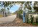 Property entrance with a gated driveway and stone pillars at 3960 Laurel Se Ave, Lakeland, FL 33812