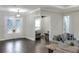 Elegant entryway with double doors and hardwood floors at 3960 Laurel Se Ave, Lakeland, FL 33812