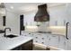Modern kitchen with dark wood accents and quartz countertops at 3960 Laurel Se Ave, Lakeland, FL 33812