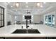 Kitchen island with quartz countertop and black sink at 3960 Laurel Se Ave, Lakeland, FL 33812