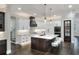 Modern kitchen with white and dark wood cabinets at 3960 Laurel Se Ave, Lakeland, FL 33812