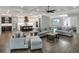 Open concept living room with kitchen and hardwood floors at 3960 Laurel Se Ave, Lakeland, FL 33812