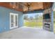 Covered patio with fireplace and ceiling fan at 3960 Laurel Se Ave, Lakeland, FL 33812