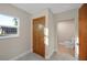 Clean bathroom with toilet and door to exterior at 410 N Tecumseh Ave, Fort Meade, FL 33841