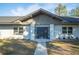 House exterior with a modern front door at 410 N Tecumseh Ave, Fort Meade, FL 33841