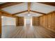 Living area with wood features, built-ins, and hardwood floors at 410 N Tecumseh Ave, Fort Meade, FL 33841