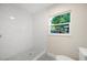 Clean shower with white subway tiles at 410 N Tecumseh Ave, Fort Meade, FL 33841