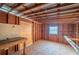 Workshop with workbench, pegboard, and exterior door at 410 N Tecumseh Ave, Fort Meade, FL 33841